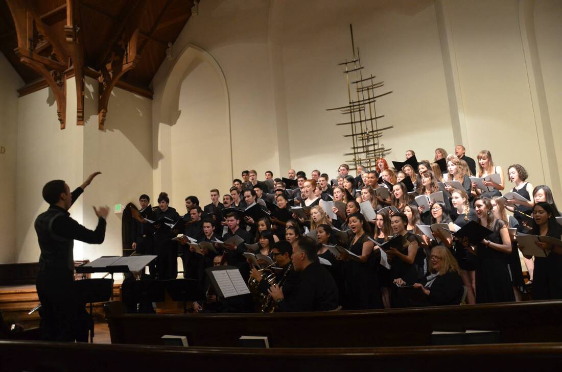 Combined choruses performing